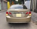 Chevrolet Cruze 2010 - Gia đình cần bán Cruze 2010, số sàn, màu vàng cát, gia đình sử dụng