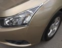 Chevrolet Cruze 2010 - Gia đình cần bán Cruze 2010, số sàn, màu vàng cát, gia đình sử dụng