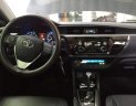 Toyota Corolla altis 1.8G 2015 - Bán Toyota Corolla altis 1.8G sản xuất 2015, màu đen, nhập khẩu