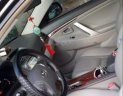 Toyota Camry 2.4G 2010 - Cần bán Toyota Camry 2.4G năm 2010, màu đen