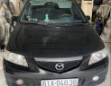 Mazda Premacy   2003 - Cần bán Mazda Premacy năm sản xuất 2003, màu đen, xe gia đình sử dụng