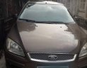 Ford Focus   2005 - Cần bán xe Ford Focus năm 2005, màu nâu, xe đã đi được 95000 km