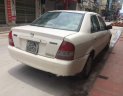 Mazda 323 2002 - Bán Mazda 323 năm sản xuất 2002, màu trắng, nhập khẩu nguyên chiếc 