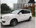 Kia Carens 2.0AT 2010 - Cần bán xe Kia Carens 2.0AT sản xuất 2010, màu trắng, xe gia đình