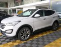 Hyundai Santa Fe 2.4AT 4WD 2015 - Bán xe Hyundai Santa Fe 2.4AT 4WD năm sản xuất 2015, màu trắng