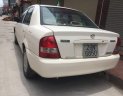 Mazda 323 2002 - Bán Mazda 323 năm sản xuất 2002, màu trắng, nhập khẩu nguyên chiếc 