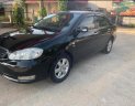 Toyota Corolla altis 1.8G MT 2004 - Bán Toyota Corolla altis 1.8G MT năm 2004, màu đen