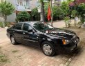 Daewoo Magnus   2004 - Cần bán lại xe cũ Daewoo Magnus năm 2004, màu đen