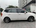 Kia Carens   2.0 AT  2010 - Cần bán Kia Carens 2.0 AT đời 2010, màu trắng chính chủ 