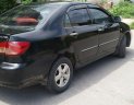 Toyota Corolla altis   2003 - Cần bán lại xe Toyota Corolla altis năm sản xuất 2003, màu đen, máy êm