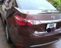 Toyota Corolla altis 1.8G AT  2015 - Chính chủ bán xe Toyota Corolla altis 1.8G AT năm sản xuất 2015, màu nâu