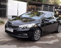 Kia K3   1.6AT 2014 - Nhu cầu đổi xe 7 chỗ nên bán Kia K3 1.6AT 2014