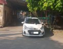 Hyundai Grand i10 1.2 AT 2018 - Bán Hyundai Grand i10 1.2 AT năm 2018, màu trắng  