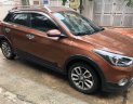 Hyundai i20 Active  1.4AT 2016 - Bán Hyundai i20 Active 1.4AT đời 2016, màu nâu, nhập khẩu