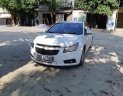 Chevrolet Cruze 2013 - Tôi cần bán xe Chevrolet Cruze 2013 màu trắng, xe đi ít, xe số sàn, đã đi 80.000km, vui lòng liên hệ để xem xe