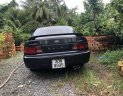 Toyota Camry 1996 - Gia đình bán Toyota Camry đời 1996, màu đen, xe nhập 