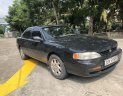 Toyota Camry 1996 - Gia đình bán Toyota Camry đời 1996, màu đen, xe nhập 