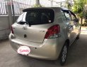 Toyota Yaris 1.3 AT 2010 - Cần bán lại xe Toyota Yaris 1.3 AT năm 2010, màu vàng, nhập khẩu 