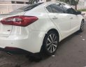 Kia K3 2.0 2014 - Bán Kia K3 2.0 sản xuất năm 2014, màu trắng chính chủ, Odo : 42000km