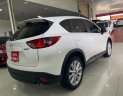 Mazda CX 5 2014 - Bán xe Mazda CX 5 năm 2014, màu trắng, mới 95%, giá tốt 680 triệu đồng