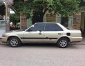 Toyota Corona GL 1.6 1990 - Cần bán xe Toyota Corona GL 1.6 sản xuất năm 1990, màu vàng 