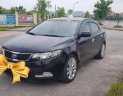 Kia Forte 2012 - Cần bán lại xe Kia Forte năm sản xuất 2012, màu đen số tự động, giá 390tr