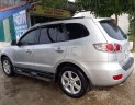 Hyundai Santa Fe MLX 2009 - Gia đình bán Hyundai Santa Fe MLX sản xuất năm 2009, màu bạc, xe nhập  