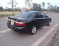 Mazda 626   2002 - Cần bán xe Mazda 626 sản xuất năm 2002, màu đen, 135tr