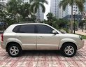 Hyundai Tucson 2.0AT 2009 - Bán Hyundai Tucson 2.0AT 2009, màu vàng, nhập khẩu, 390 triệu