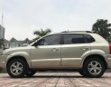 Hyundai Tucson 2.0AT 2009 - Bán Hyundai Tucson 2.0AT 2009, màu vàng, nhập khẩu, 390 triệu