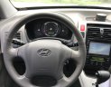 Hyundai Tucson 2.0AT 2009 - Bán Hyundai Tucson 2.0AT 2009, màu vàng, nhập khẩu, 390 triệu