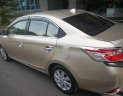 Toyota Vios 2015 - Cần bán lại xe Toyota Vios 2015, màu vàng chính chủ