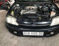 Ford Laser   2000 - Bán Ford Laser năm sản xuất 2000, màu đen, xe nhập