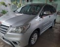 Toyota Innova 2014 - Cần bán gấp Toyota Innova 2014, màu bạc