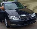 Toyota Camry 2.4G 2004 - Cần bán gấp Toyota Camry 2.4G 2004, màu đen