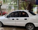 Daewoo Lanos SX 2002 - Cần bán gấp Daewoo Lanos SX đời 2002, màu trắng số sàn