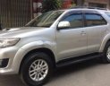 Toyota Fortuner 2014 - Gia đình bán xe Toyota Fortuner sản xuất 2014, màu bạc, giá chỉ 755 triệu