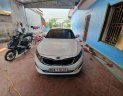 Kia Optima   2014 - Bán xe Kia Optima sản xuất 2014, màu trắng, nhập khẩu, giá chỉ 670 triệu