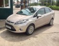 Ford Fiesta 2011 - Bán Ford Fiesta sản xuất 2011, màu vàng cát
