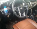 Toyota Innova 2016 - Cần bán lại xe Toyota Innova năm 2016, màu bạc số sàn