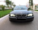 BMW 3 Series 2005 - Cần bán BMW 325i 2005, màu đen số tự động