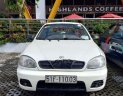 Daewoo Lanos SX 2002 - Cần bán gấp Daewoo Lanos SX đời 2002, màu trắng xe gia đình  