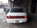 Mazda 323  MT 1996 - Bán ô tô Mazda 323 MT 1996, màu trắng