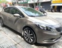 Kia K3 2014 - Cần bán xe Kia K3 năm 2014, màu vàng