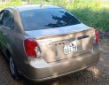 Daewoo Lacetti   2011 - Bán Daewoo Lacetti SE đời 2011, màu vàng, xe gia đình