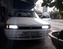 Mazda 323  MT 1996 - Bán ô tô Mazda 323 MT 1996, màu trắng