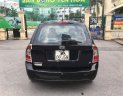 Kia Carens 2011 - Bán Kia Carens 2.0MT năm sản xuất 2011, màu đen, số sàn 