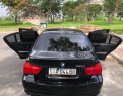 BMW 3 Series 2011 - Cần bán xe BMW 325i sản xuất năm 2011, màu đen, 525tr