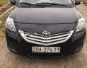 Toyota Vios 1.5 MT 2011 - Cần bán gấp Toyota Vios 1.5E năm sản xuất 2011, màu đen xe gia đình