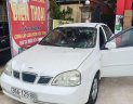 Daewoo Lacetti 2006 - Cần bán gấp Daewoo Lacetti đời 2006, màu trắng xe gia đình, giá 125tr, còn nguyên bản